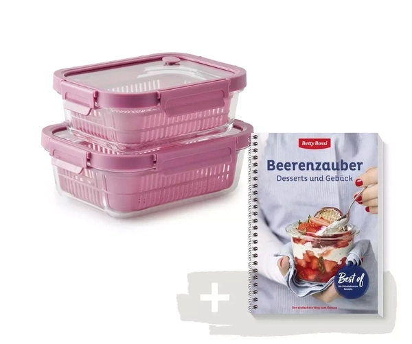 Zwei Glasbehälter mit pinken Einsätzen und Deckeln und ein Kochbuch mit dem Titel "Beerenzauber".