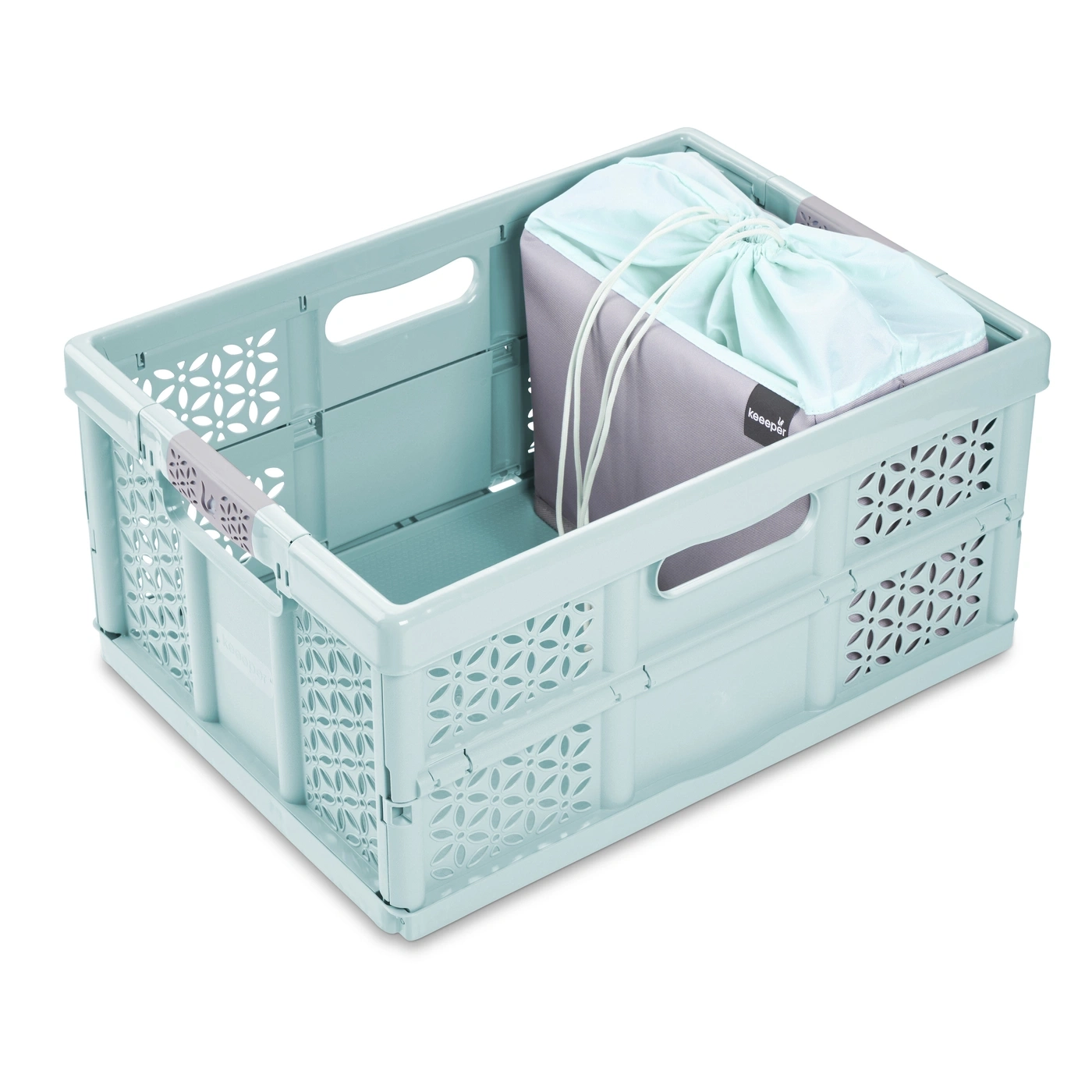 Un panier bleu pliable avec deux sacs gris et menthe à l'intérieur.