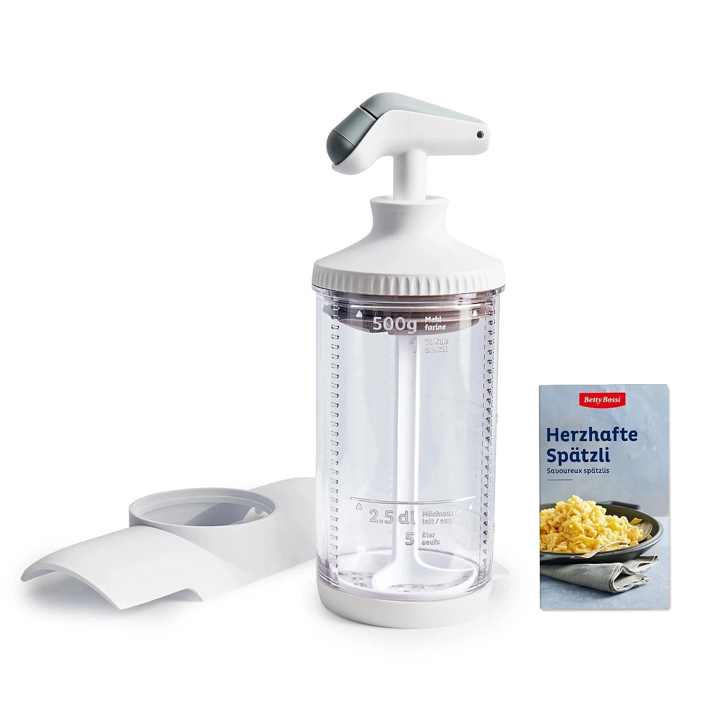 Spätzli-Zubereiter mit Zutaten und Spätzli-Packung von Betty Bossi.