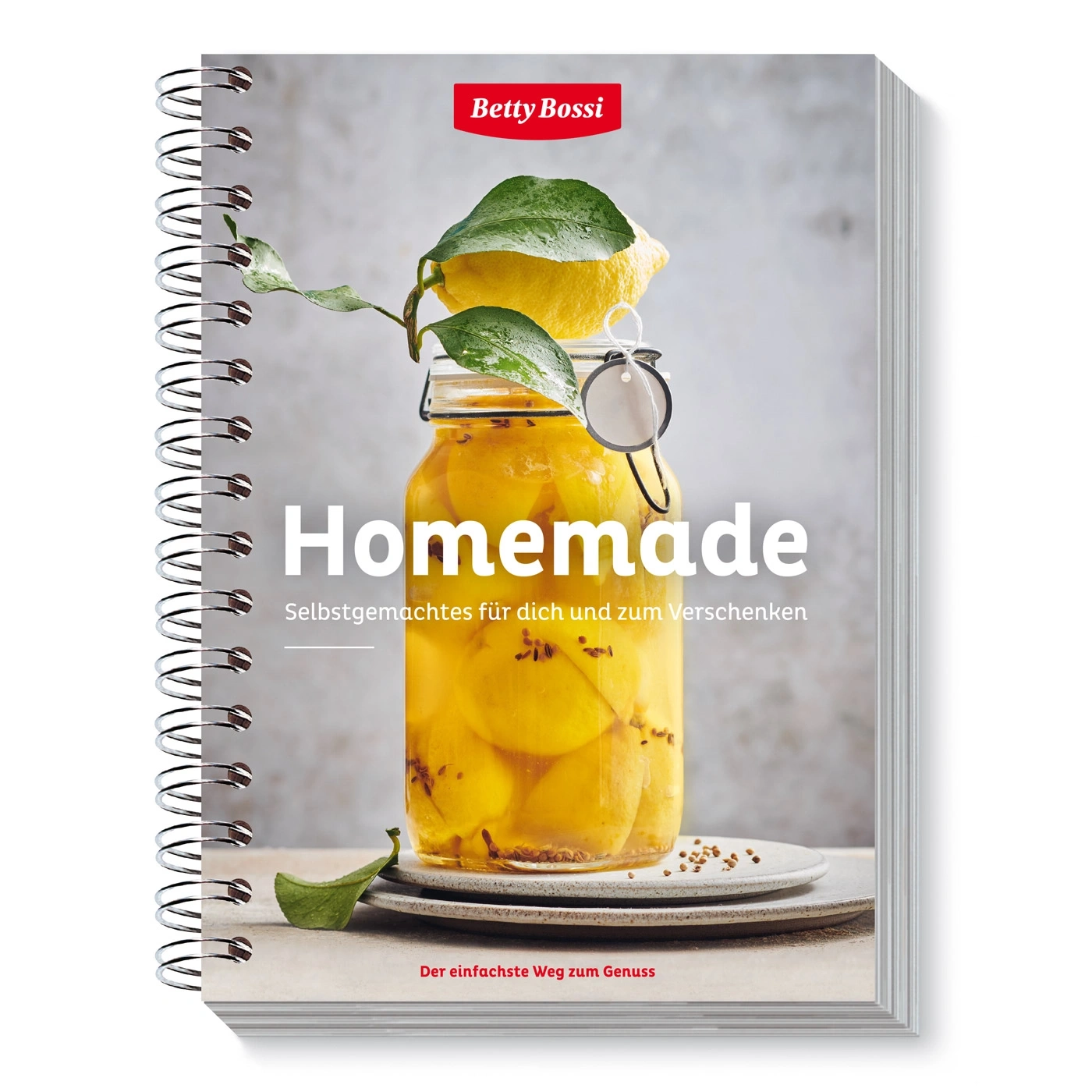Kochbuch mit dem Titel "Homemade" von Betty Bossi, gefüllt mit Zitronen.