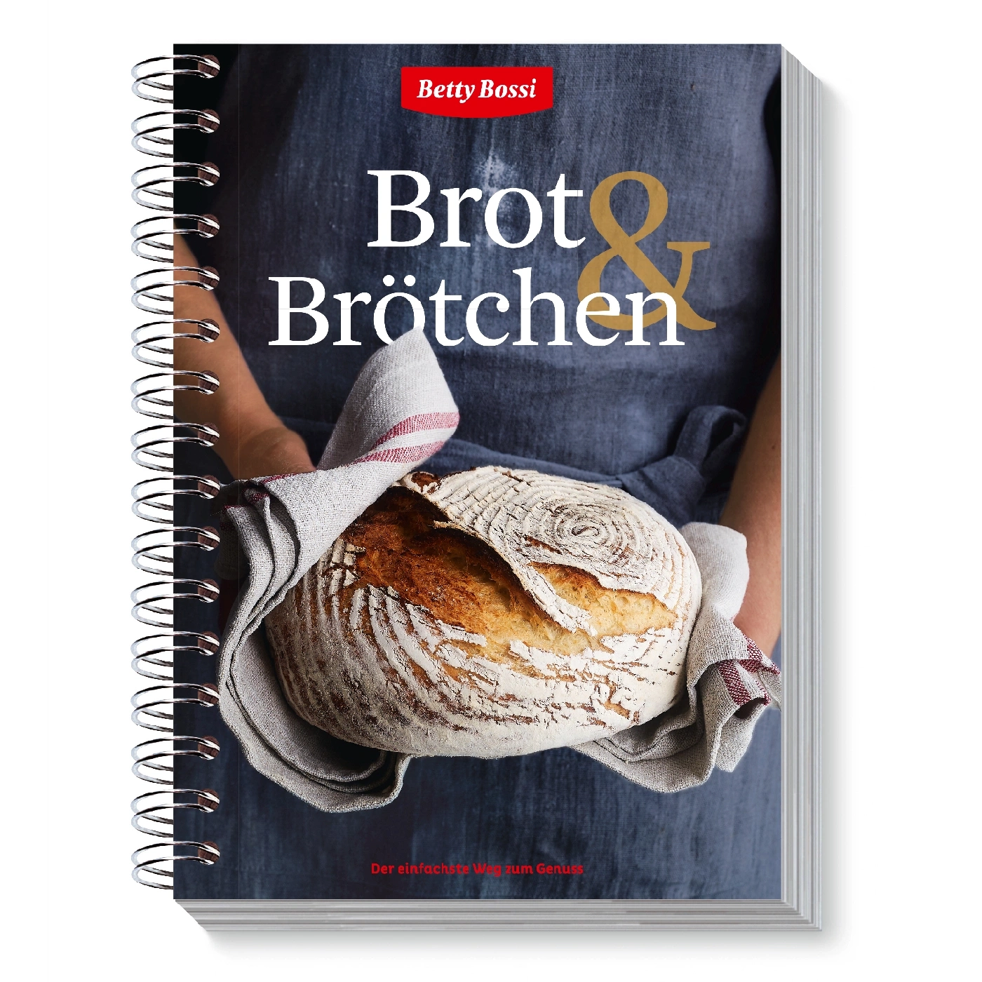 Livre de cuisine avec du pain et des petits pains, tenu par une personne.