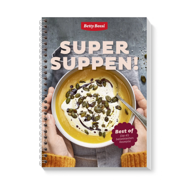 Betty Bossi Kochbuch "Super Suppen!" mit Kürbissuppe und Kürbiskernen.