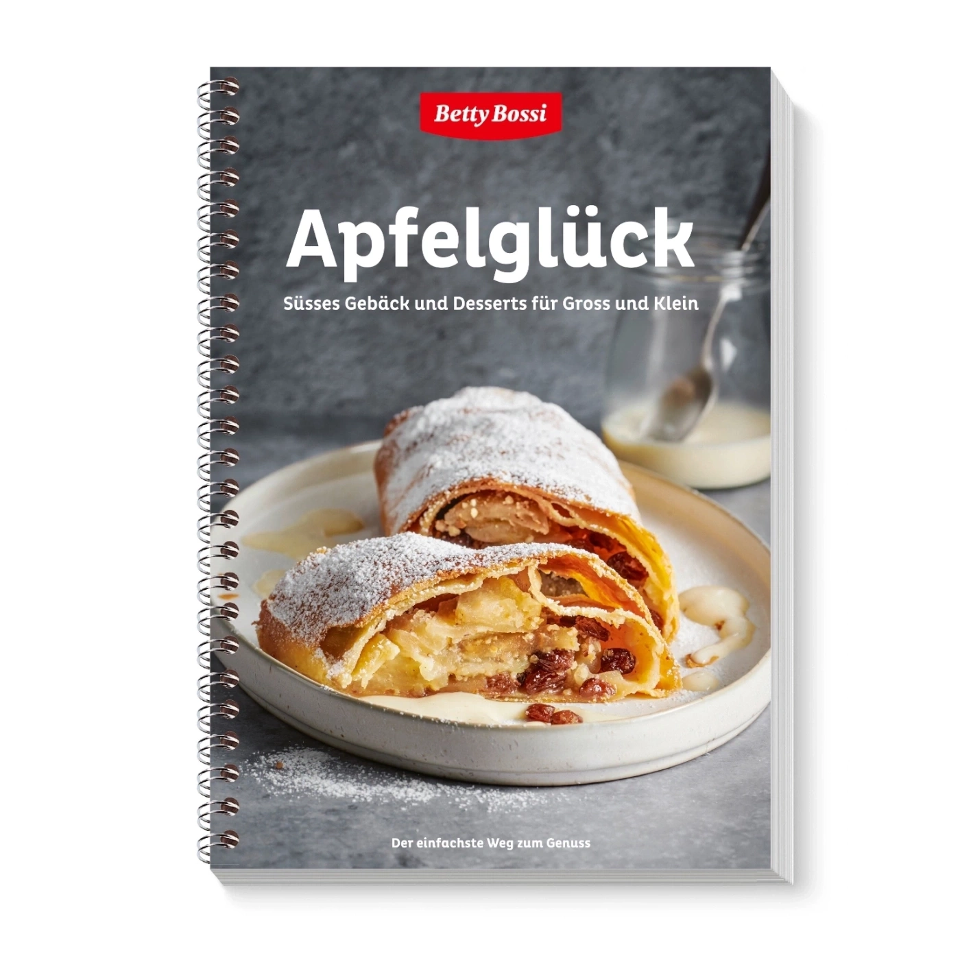 Un livre de cuisine avec un strudel aux pommes intitulé "Apfelglück".
