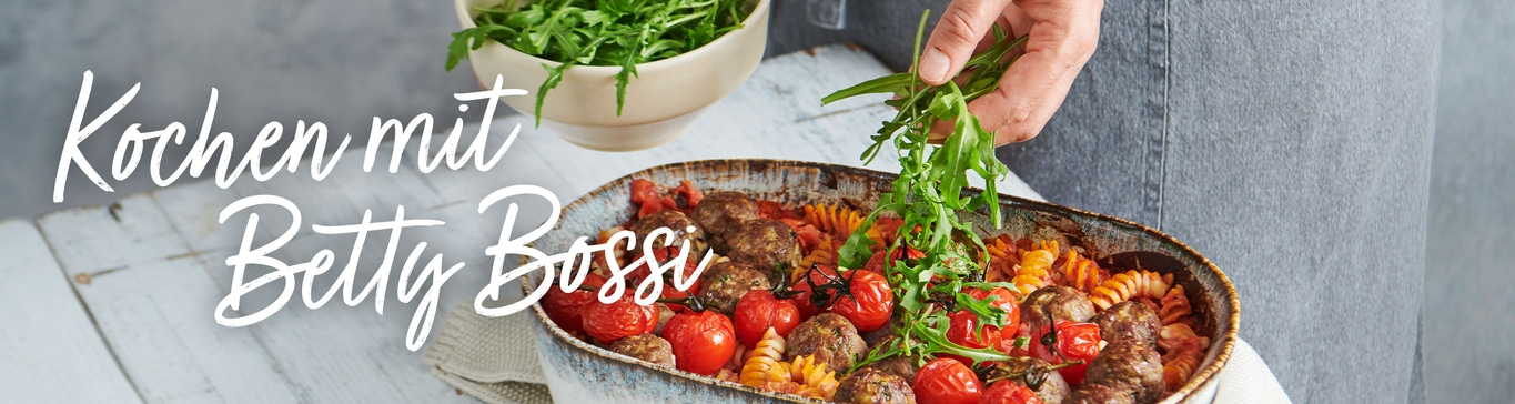 Gericht mit Fleischbällchen, Tomaten und Rucola, Kochbuch-Szene, Betty Bossi