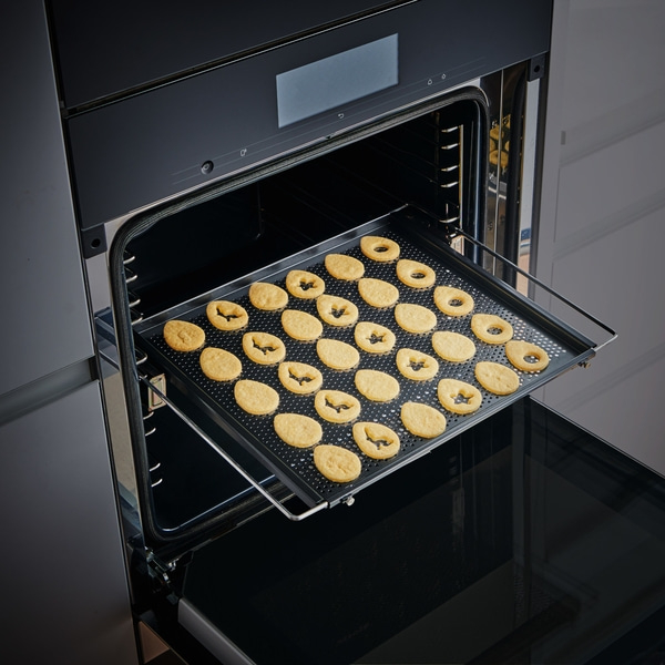 Plaque à pâtisserie Betty Bossi, perforée, extensible 40-68 cm