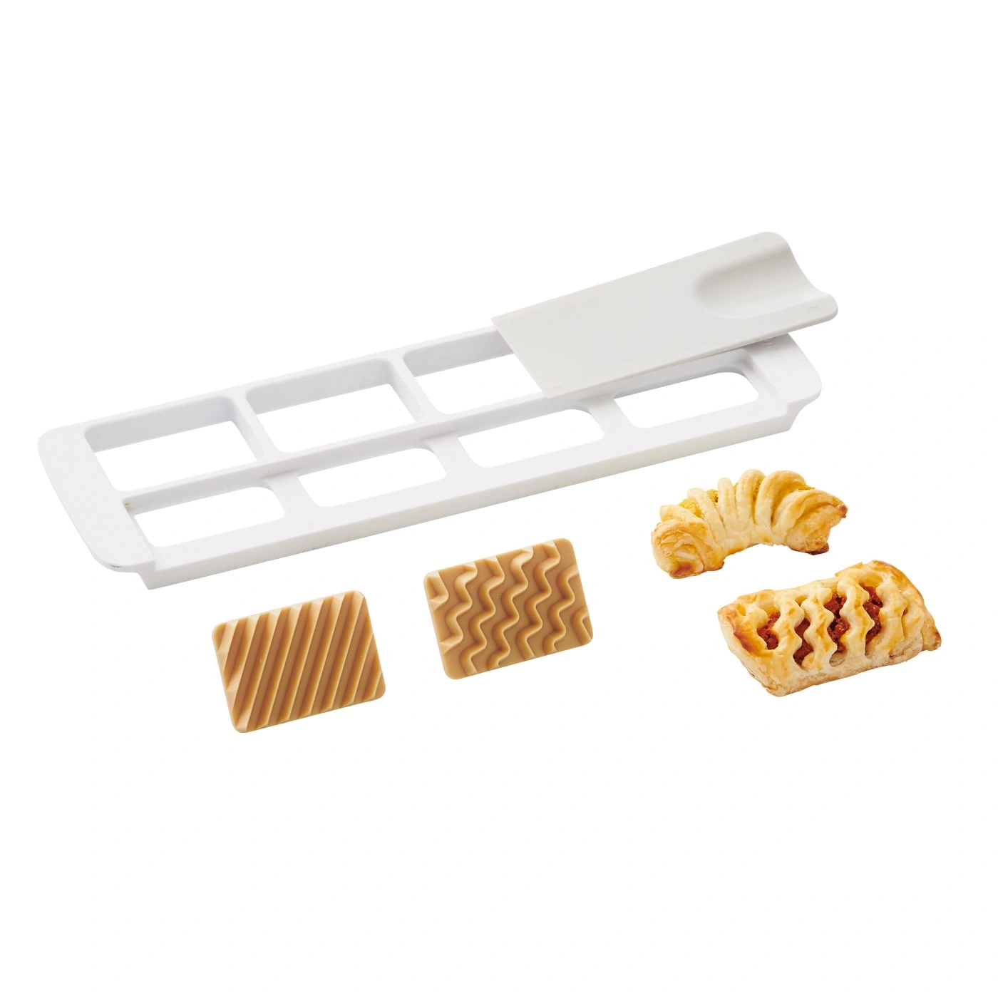 Outil de pâtisserie blanc avec pâtisseries, rectangulaire et ondulé