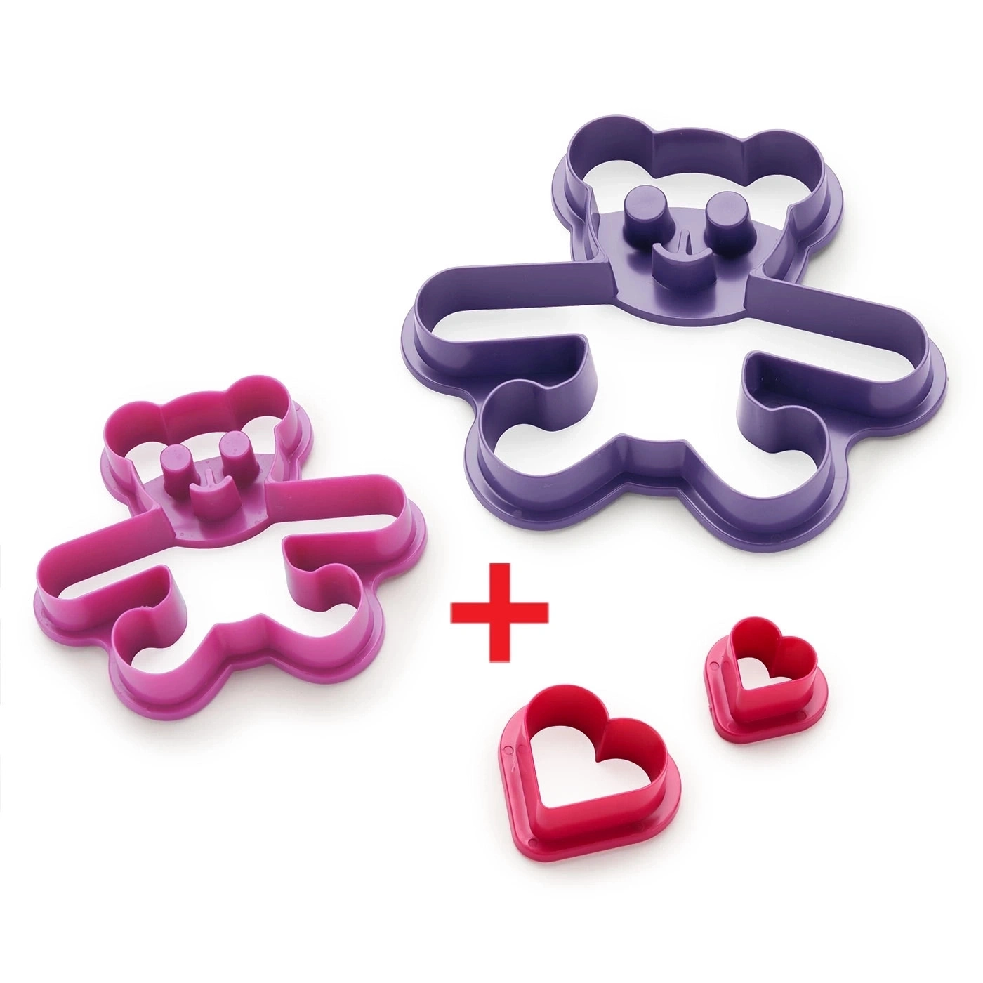 Keksformen: Bär und Herzen, plus Zeichen, rosa und lila.