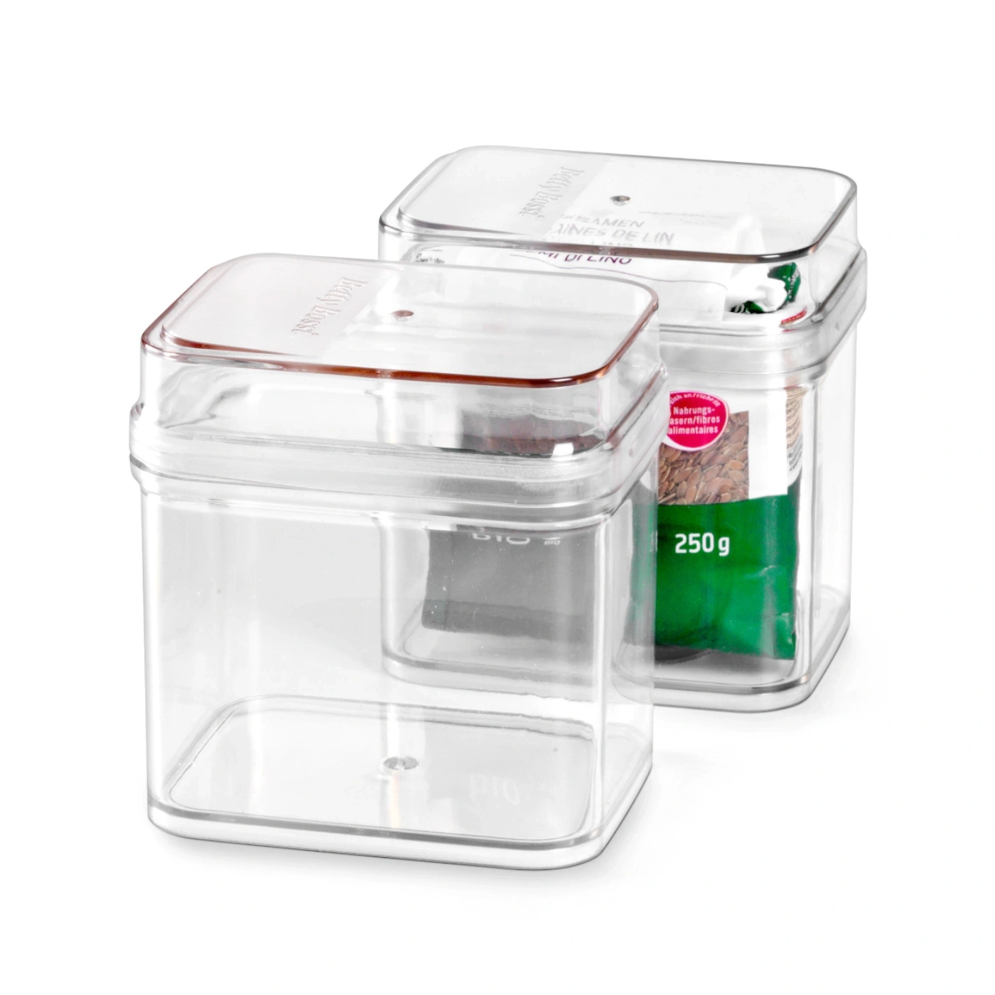 Deux boîtes transparentes avec des graines de lin, 250g, Betty Bossi, aliments.