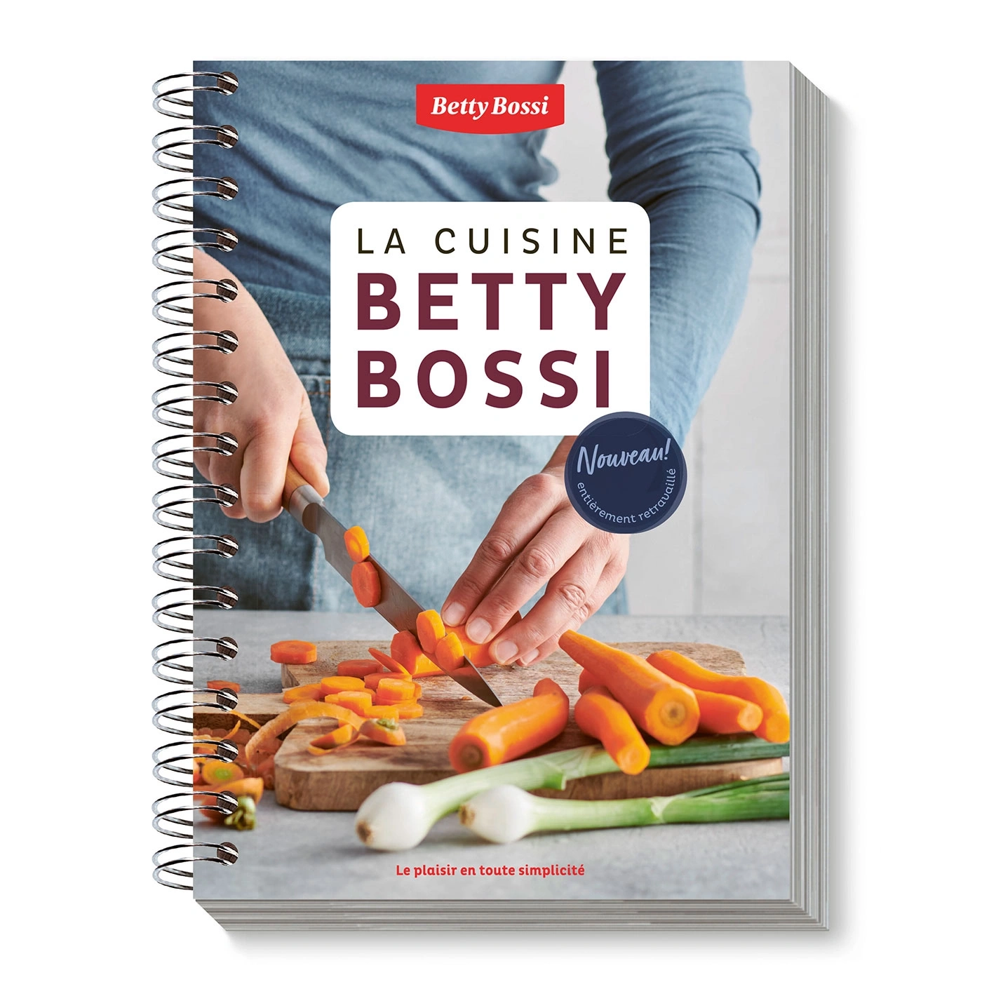 Kochbuch von Betty Bossi mit Karotten, Messer und Spiralbindung.