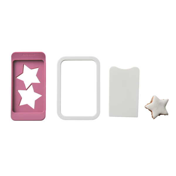 Rosa Ausstecher mit Sternen, weißer Rahmen, Spachtel und Sternkeks