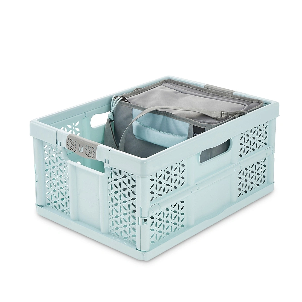 Boîte de rangement pliable bleu clair avec une glacière à l'intérieur.