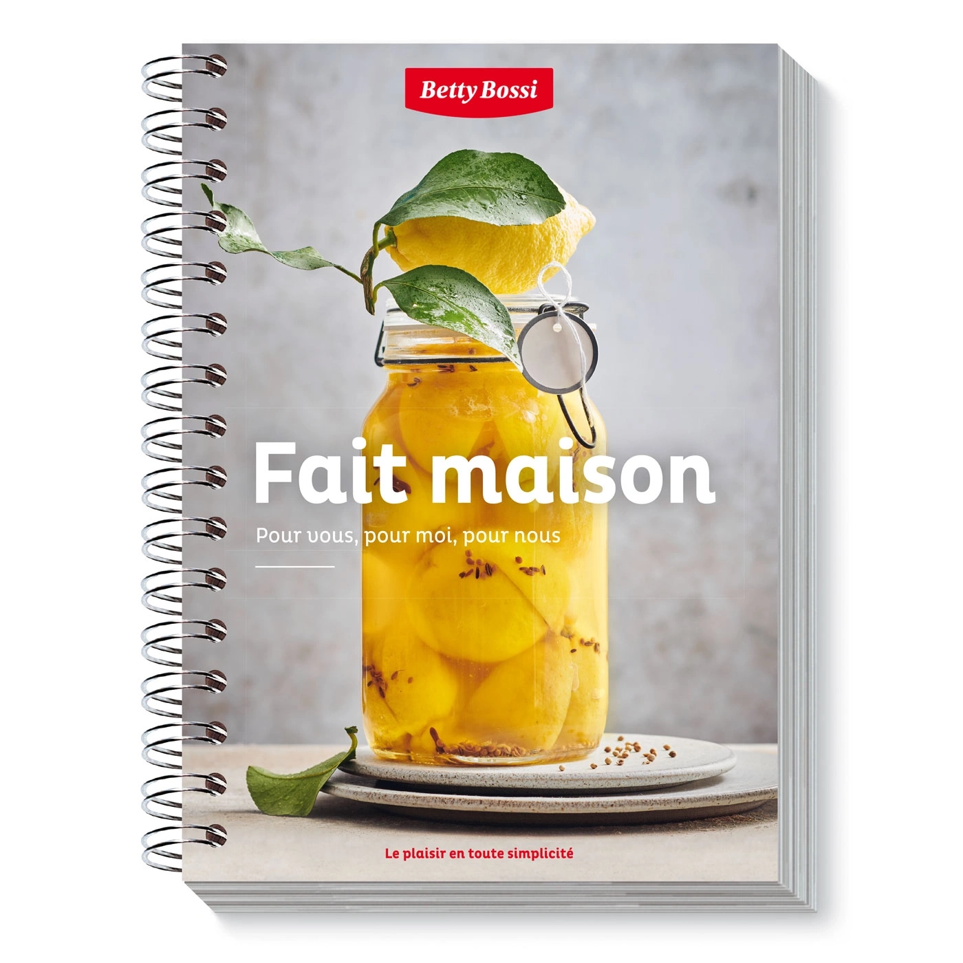 Kochbuch mit Zitronen in einem Glas, "Fait maison" und "Betty Bossi".