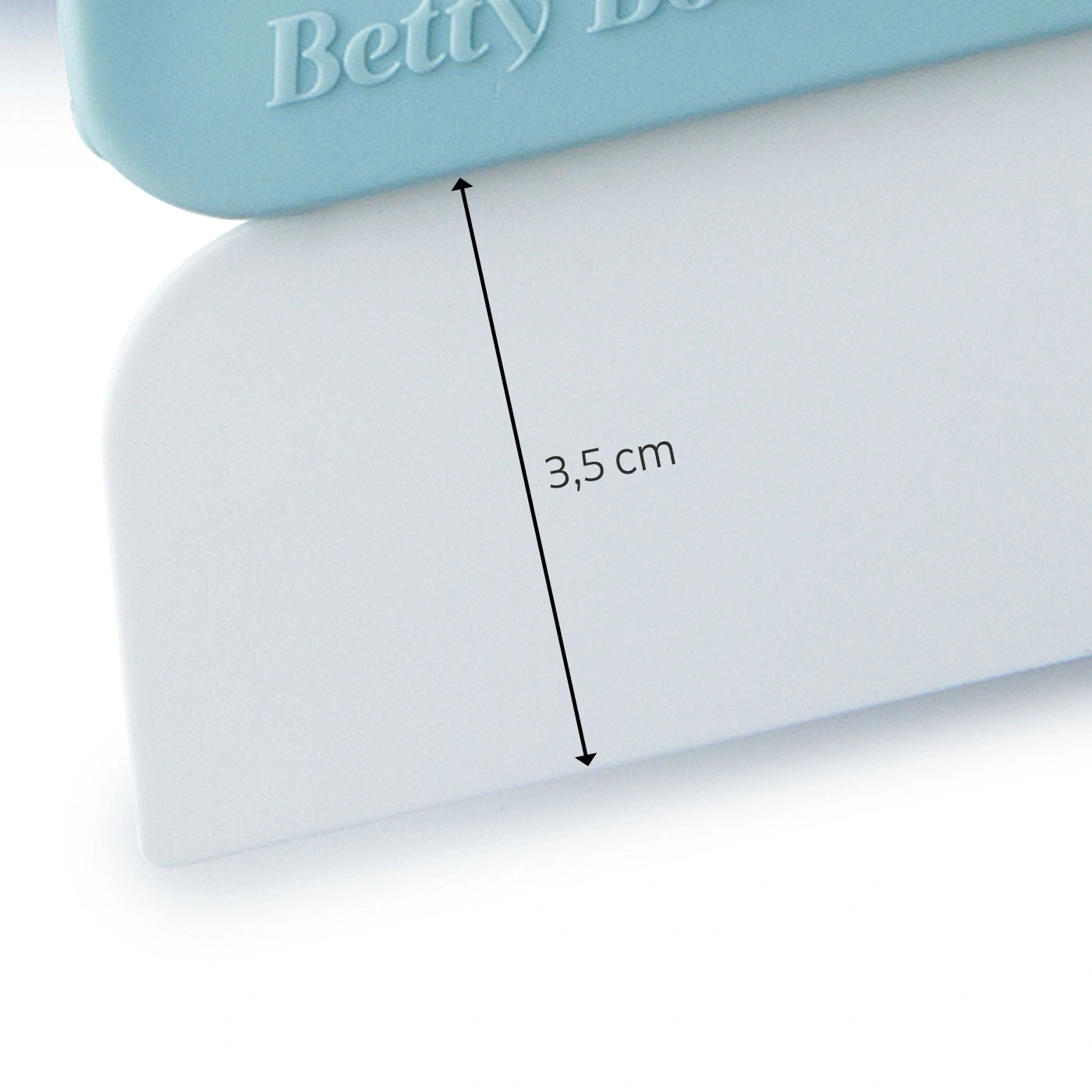 Gros plan d'un objet blanc avec une mesure de 3,5 cm